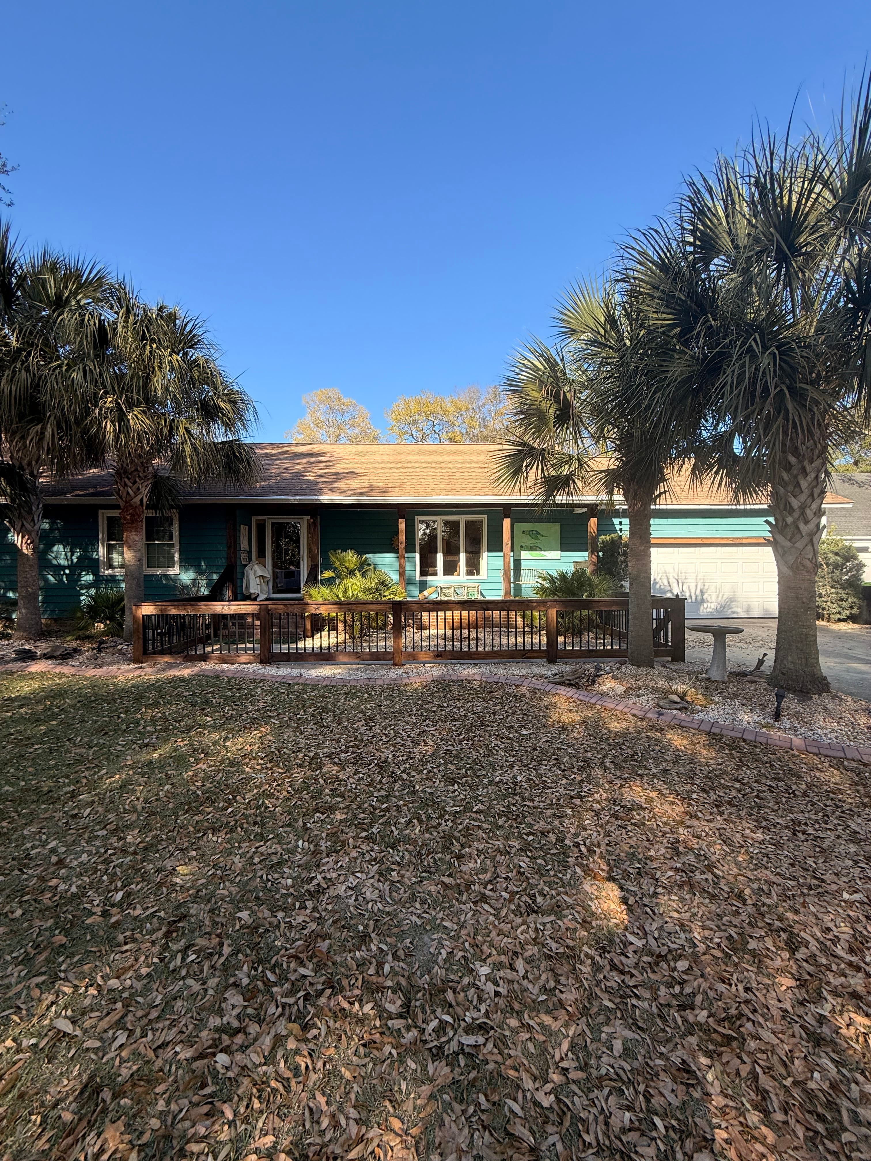 Project Coastal Home Makeover with Custom Fencing and Trim image