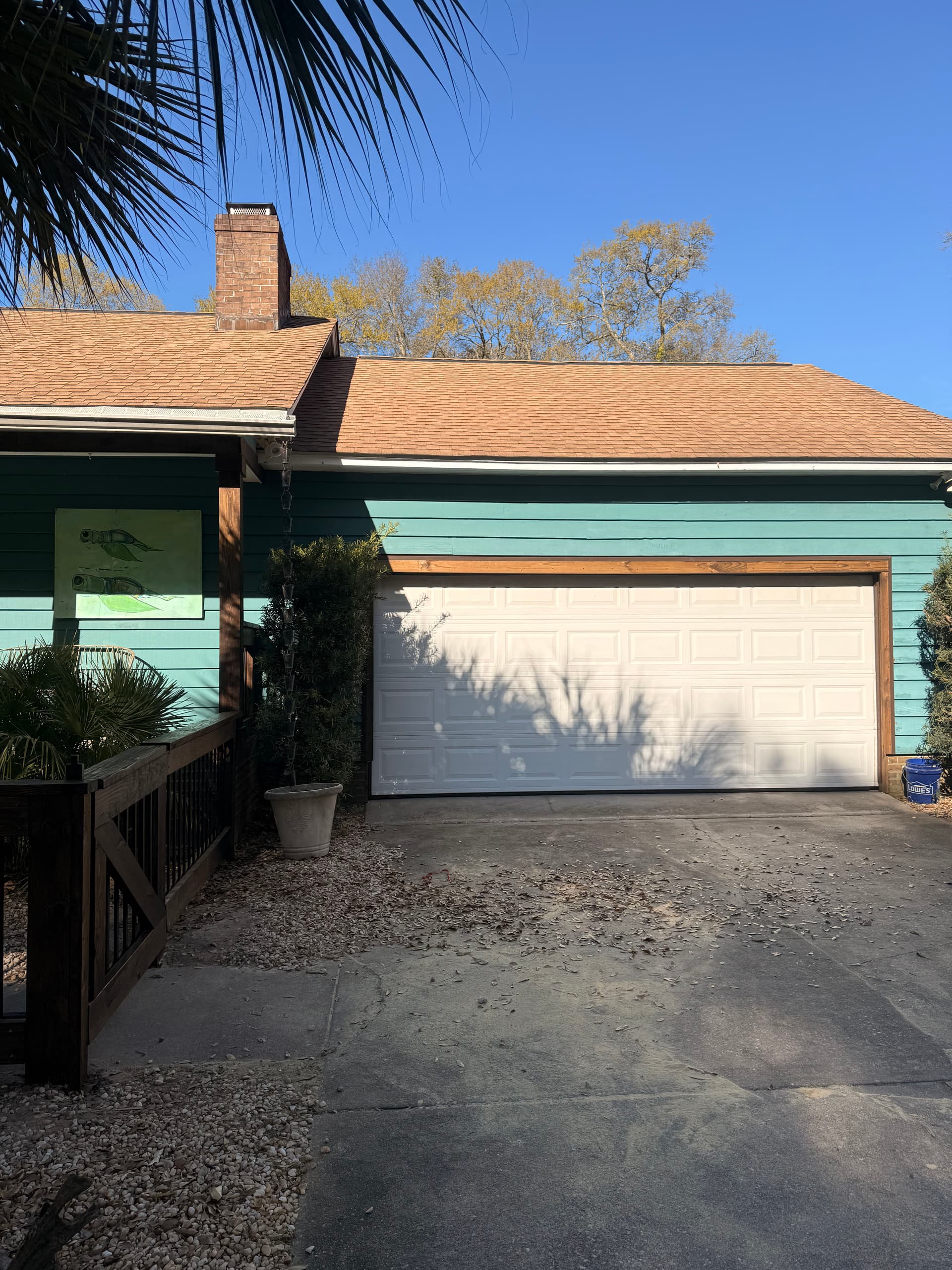 Coastal Home Makeover with Custom Fencing and Trim