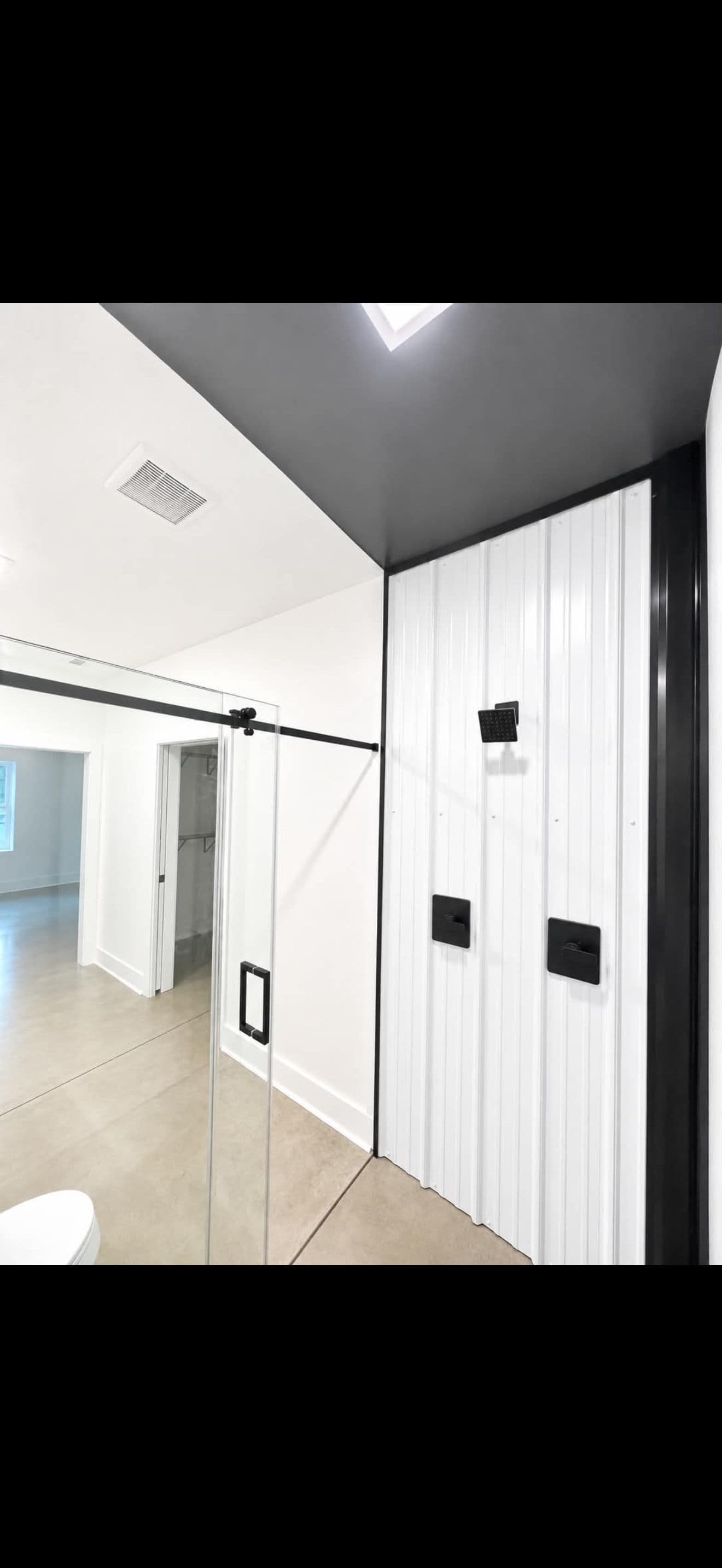 Gallery photos for Modern Bathroom Upgrade with Metal Walls and Frameless Shower Doors: Image #3